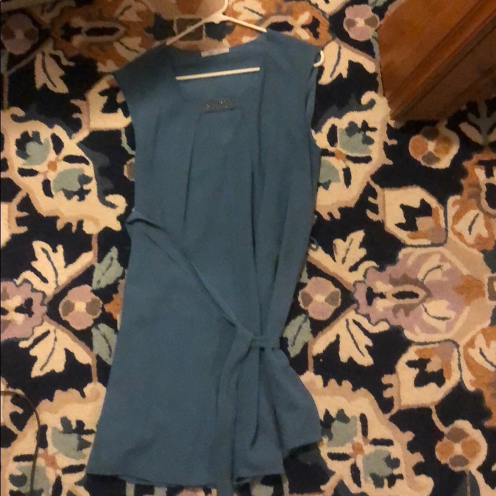 Blue dress bought from boutique, never worn